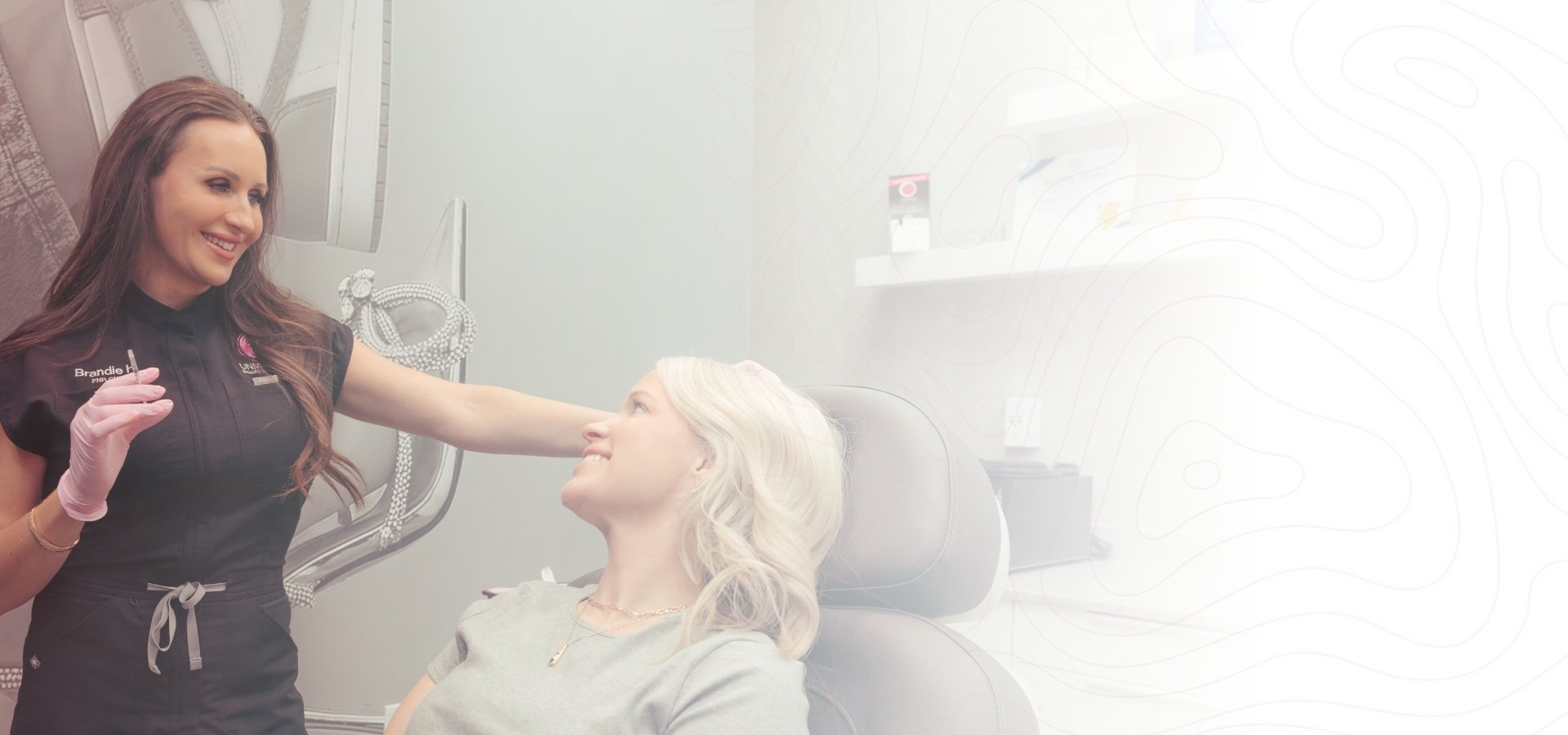 Brandie with a patient in the treatment room